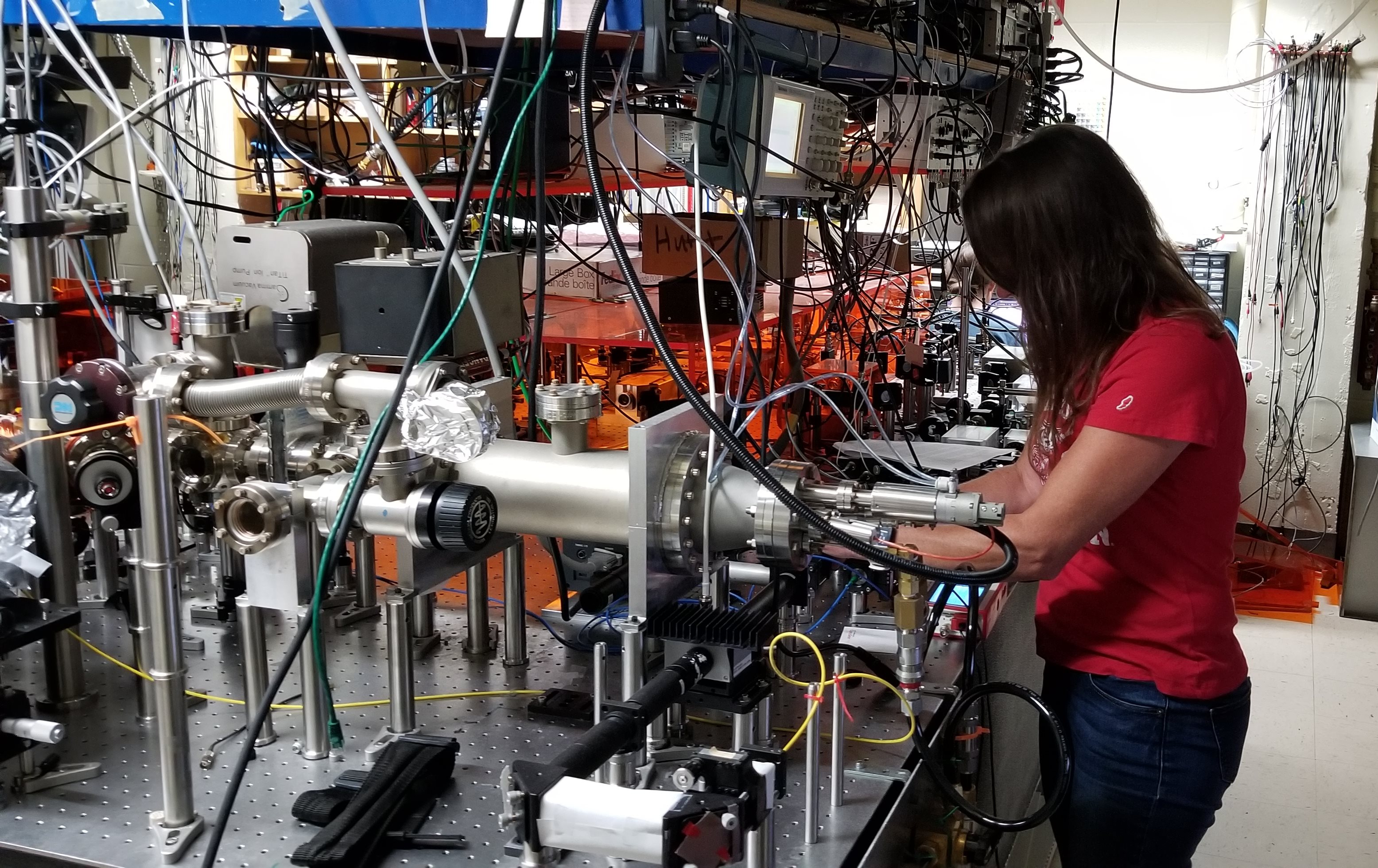 2022 TeachQuantum teacher Jamie Lauer works on her experiment in the lab at UW&amp;ndash;Madison.